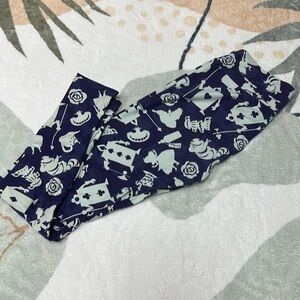 Lularoe purple Alice in wonderland leggings.